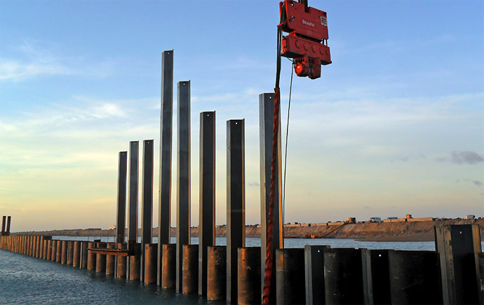Sheet pile with vibratory hammers